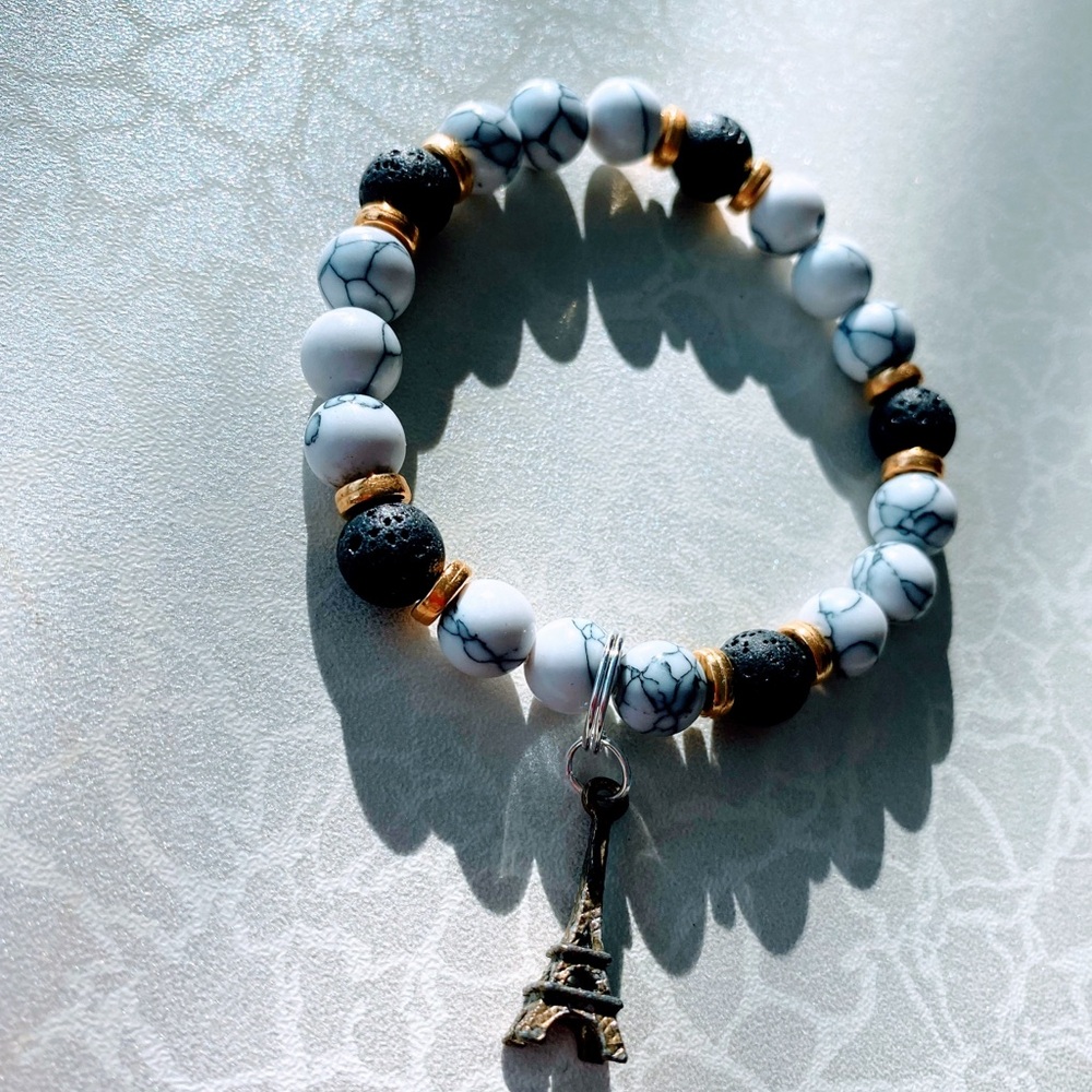 White and Black Beaded Bracelet with Eiffel Tower Charm